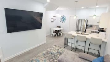 Townhome, Multiple Beds, Kitchen, Garden View (Villas de Laguna 2) | Living area | 75-inch flat-screen TV with digital channels