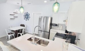 Townhome, Multiple Beds, Kitchen, Garden View (Villas de Laguna 2) | Private kitchen | Fridge, microwave, oven, stovetop - Villas de Laguna 2 (South Padre Island)