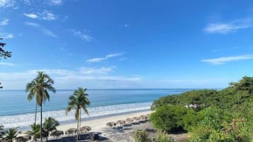 Beach nearby, white sand, beach shuttle, beach umbrellas