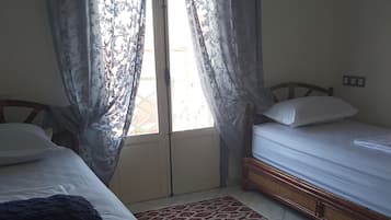 2 habitaciones, tabla de planchar con plancha y wifi gratis