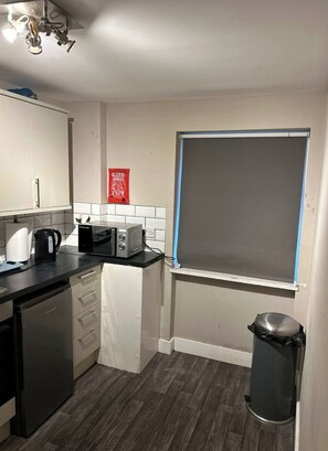 Fridge, microwave, electric kettle, toaster