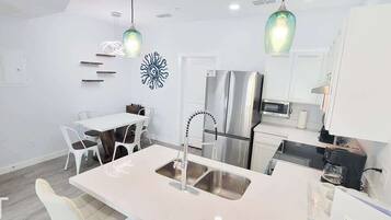 Condo, Multiple Beds, Kitchen, Garden View (Villas de Laguna 3) | Private kitchen | Fridge, microwave, oven, stovetop