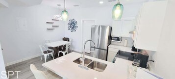 Condo, Multiple Beds, Kitchen, Garden View (Villas de Laguna 4) | Private kitchen | Fridge, microwave, oven, stovetop