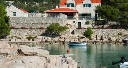 Luxury 4BR Seafront Villa with Heated Pool