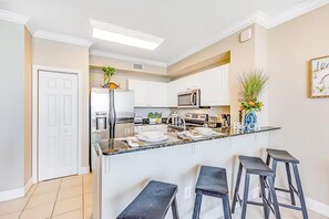 Condo, Multiple Beds (Tidewater 913) | Private kitchen | Oven, cookware/dishes/utensils