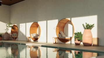 Indoor pool, outdoor pool, pool umbrellas, sun loungers