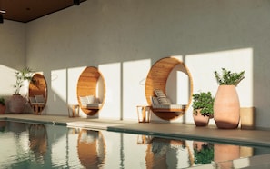 Indoor pool, outdoor pool, pool umbrellas, sun loungers