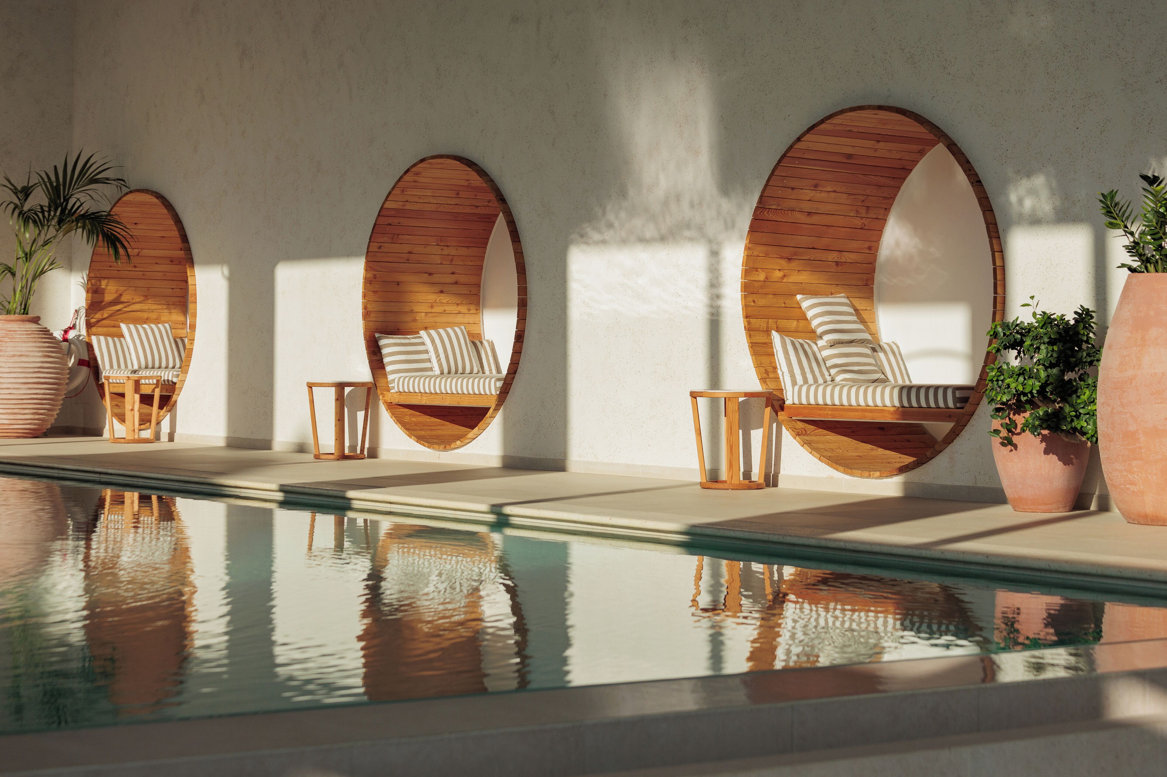 Indoor pool, outdoor pool, pool umbrellas, sun loungers