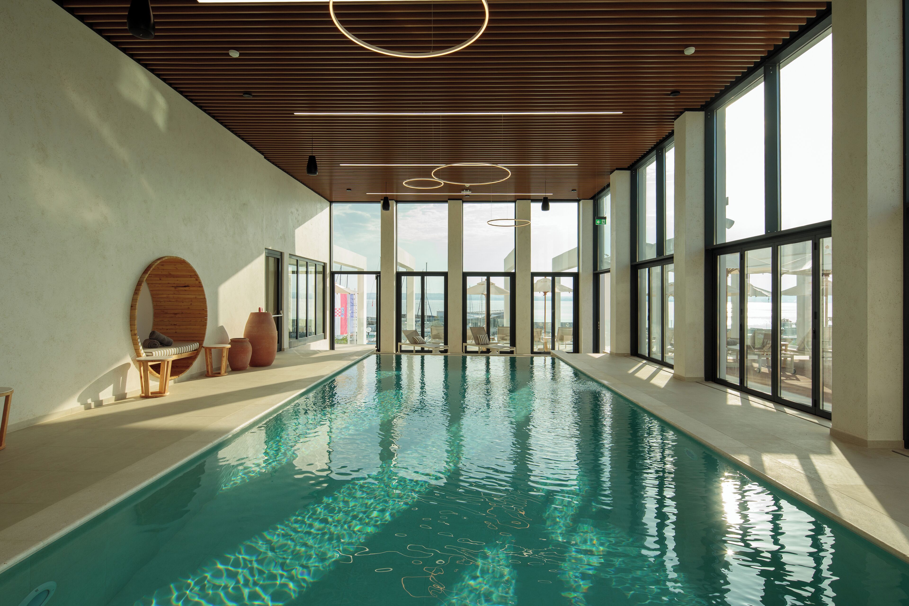 Indoor pool, outdoor pool, pool umbrellas, sun loungers