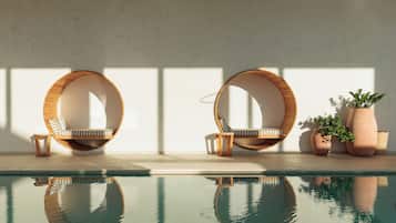 Indoor pool, outdoor pool, pool umbrellas, sun loungers