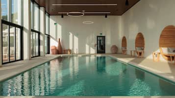Indoor pool, outdoor pool, pool umbrellas, sun loungers