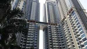 A high-rise building with multiple floors, large windows, and balconies. - Atlantis Residence by Jeffery Lam Home Management (Melaka)