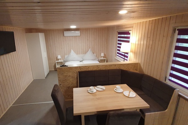 Bangalô conforto, vista para o parque | Banheiro | Chuveiro, papel higiênico