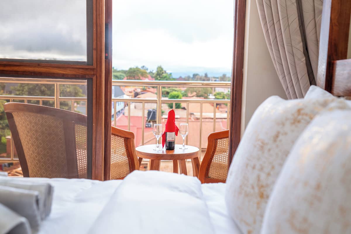 Deluxe Room, City View | Desk, laptop workspace, free WiFi, bed sheets