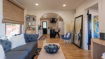 Smart TV, fireplace, books, printers