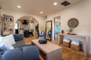 Smart TV, fireplace, books, printers