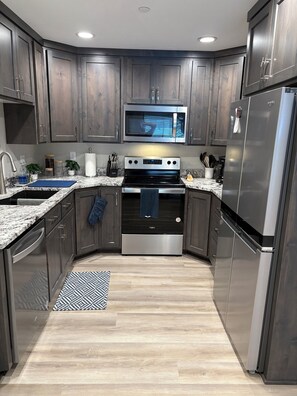 Microwave, oven, stovetop, dishwasher - Tranquil Teton Treasure 3-bedroom, 2-bathroom condo in Victor, Idaho (Victor)