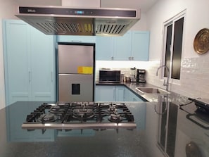 Fridge, microwave, coffee/tea maker, toaster