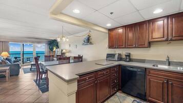 Coffee/tea maker, fridge, microwave, oven