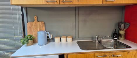 Fridge, stovetop, coffee/tea maker, toaster