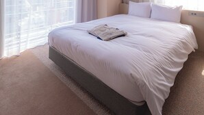 A hotel room with a large bed, two windows with sheer curtains, a city view, and a modern design. - THE BASEMENT HOTEL Osaka Honmachi  (Osaka)