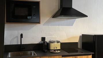 Microwave, stovetop, coffee/tea maker, toaster