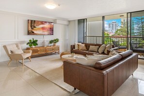 Deluxe Apartment, 3 Bedrooms | Living area | 45-inch Smart TV with cable channels - Beautiful 3-Bedroom Haven  (Surfers Paradise)