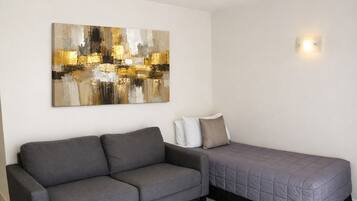 Apartment, 1 Bedroom | Living area | 45-inch Smart TV with digital channels