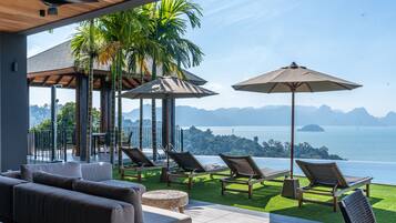 Outdoor pool, free pool cabanas, pool umbrellas