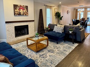 Smart TV, fireplace, books