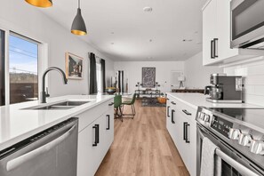 Fridge, microwave, dishwasher, coffee/tea maker