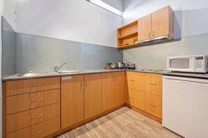Microwave, stovetop, coffee/tea maker, toaster