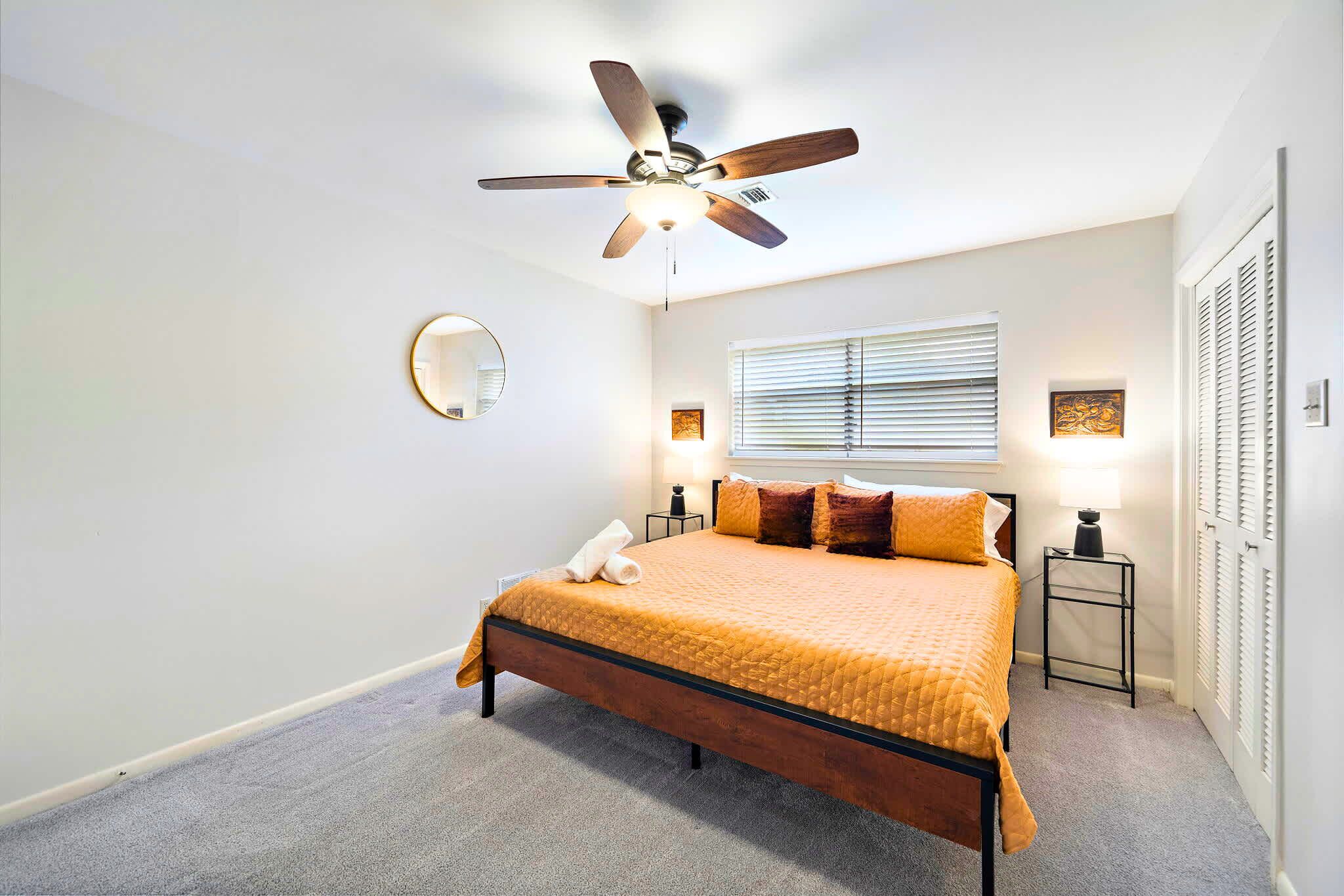 Bedroom Retreat: Bright and airy space with stylish decor and a perfect spot to unwind!