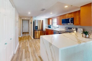 Fridge, microwave, dishwasher, coffee/tea maker