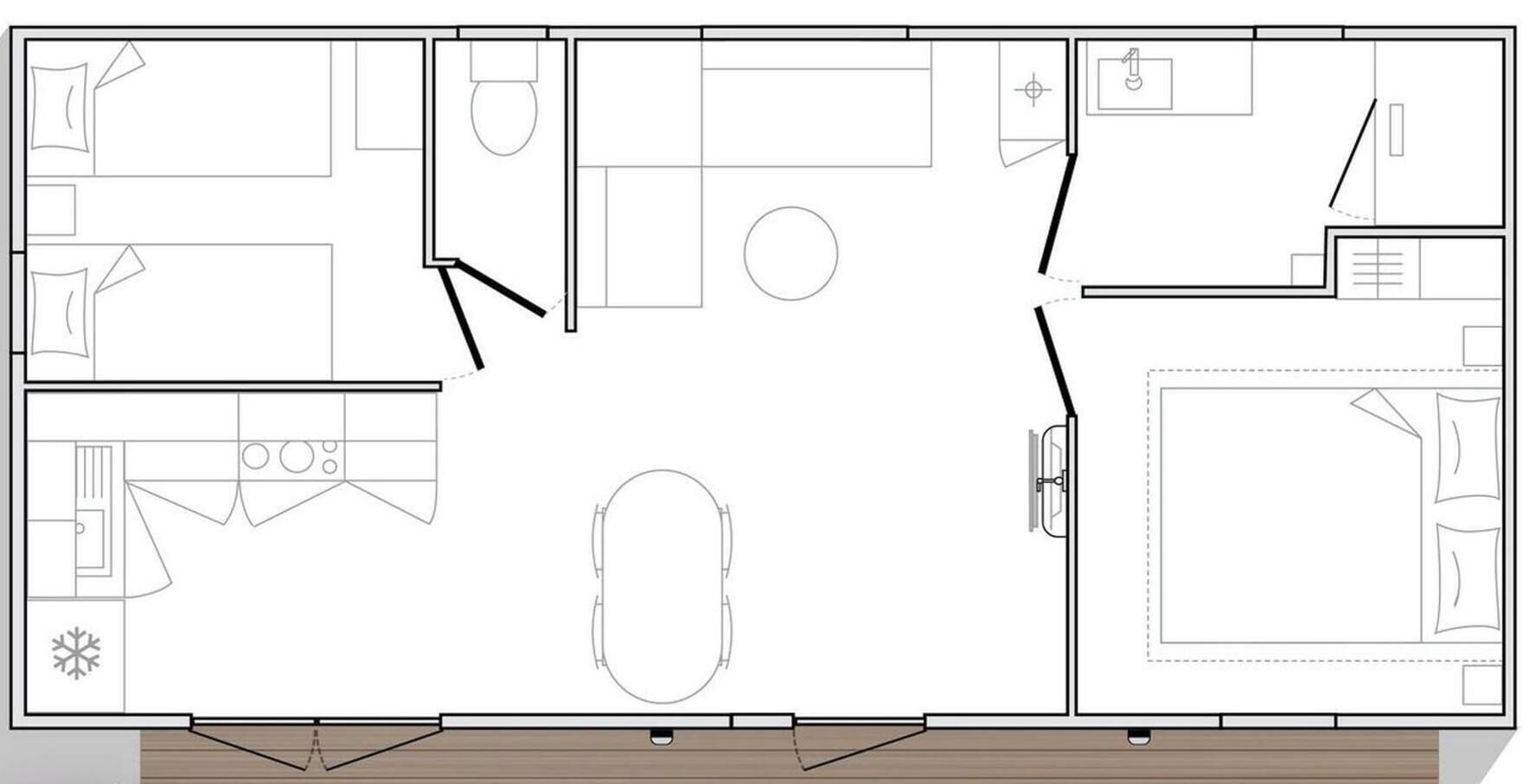 A floor plan of a hotel room with a bathroom, a kitchenette, a dining area, and a living space.