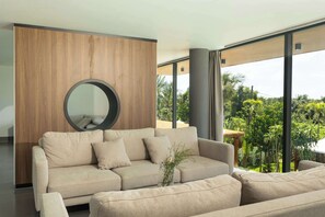 Vila conforto, sacada, vista para o jardim | Sala de estar | TV LCD 65 polegadas com canais a cabo, lareira, pisos aquecidos