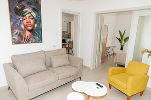 Deluxe Villa, Pool View | Living area | 58-inch Smart TV with digital channels, video-game console - luxsuites (Chania)