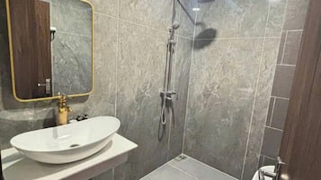 Basic Double Room, City View | Bathroom | Combined shower/tub, hair dryer, towels, soap