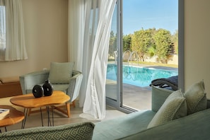Villa, 2 Bedrooms, Private Pool | Living area | 32-inch LCD TV with cable channels, DVD player
