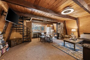 Smart TV, fireplace, books