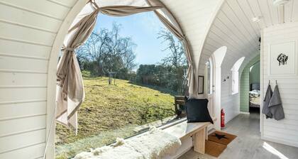 Tiny Home 'Stall Und Sterne - Großer Wagen' mit privater Terrasse, Gemeinschaftsgarten und Wi-Fi