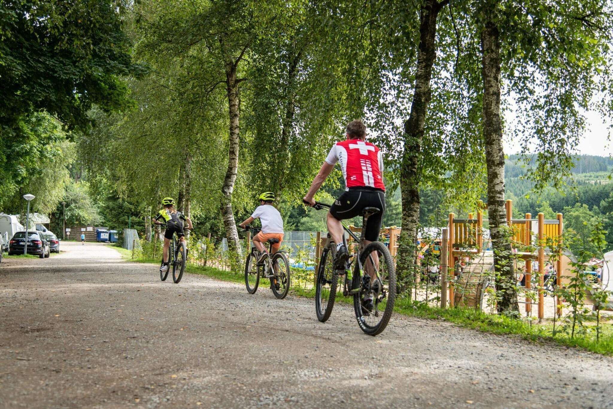 A gravel path with cyclists.
