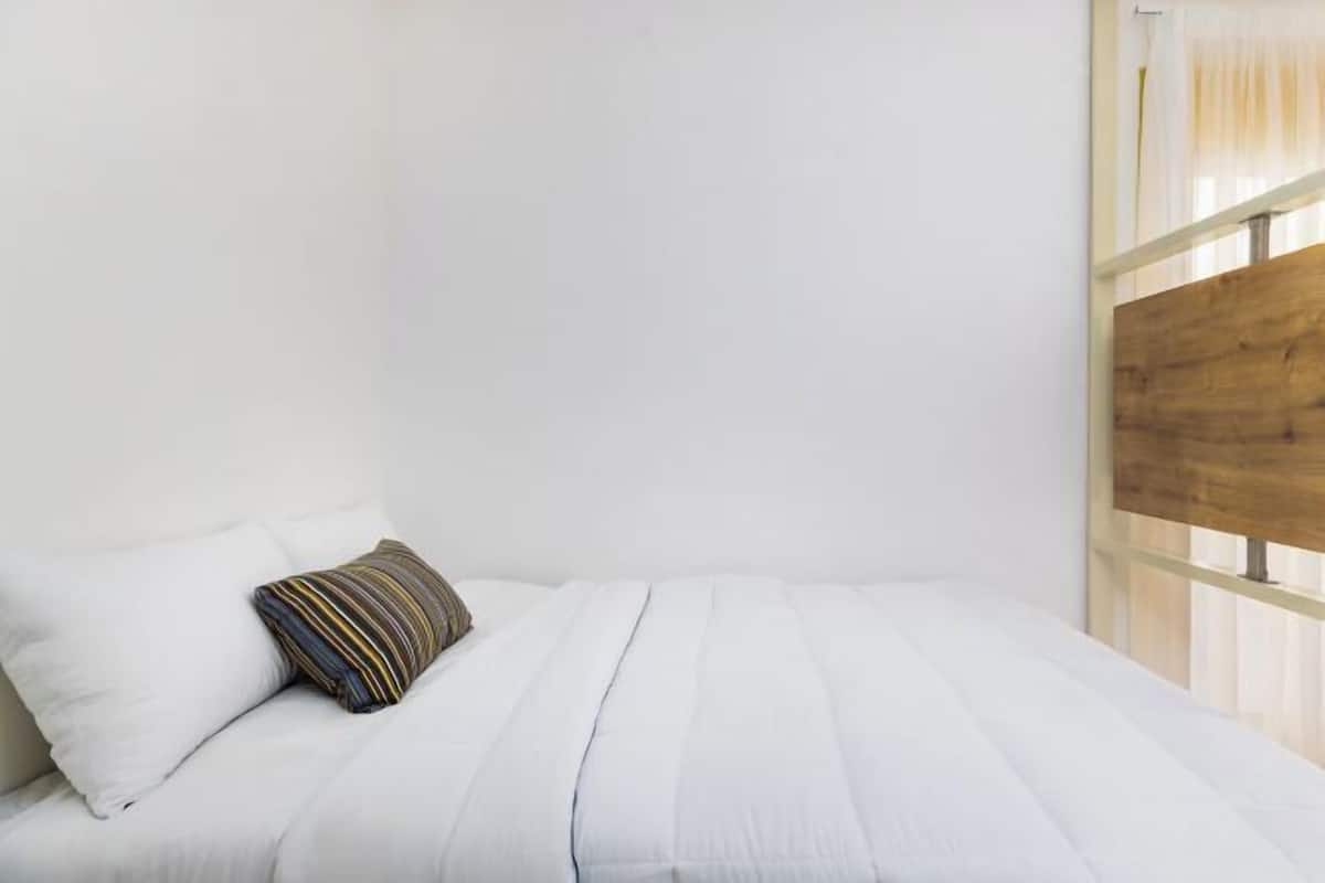 Desk, laptop workspace, blackout curtains, iron/ironing board
