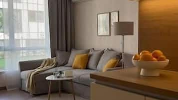 Departamento, 1 habitación, vista al jardín | Sala de estar