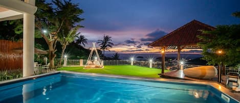 Outdoor pool, pool umbrellas, pool loungers