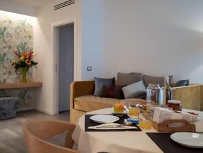 Apartment, City View | Living area | 42-inch Smart TV with cable channels, Netflix, streaming services