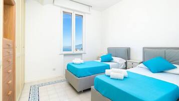 3 bedrooms, desk, iron/ironing board, travel cot