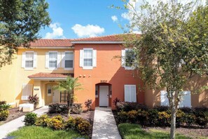 Exterior - Welcome to Our Stunning 3-Bedroom townhome – Perfect for Families & Groups!<br>Experience comfort, and top-tier hospitality in our 3-bedroom, 2.5-bathroom townhouse, designed to accommodate up to 9 guests. Whether you're planning a family vacation (Kissimmee)