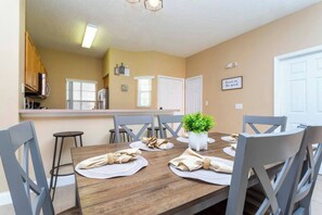 Dining - Welcome to Our Stunning 3-Bedroom townhome – Perfect for Families & Groups!<br>Experience comfort, and top-tier hospitality in our 3-bedroom, 2.5-bathroom townhouse, designed to accommodate up to 9 guests. Whether you're planning a family vacation (Kissimmee)