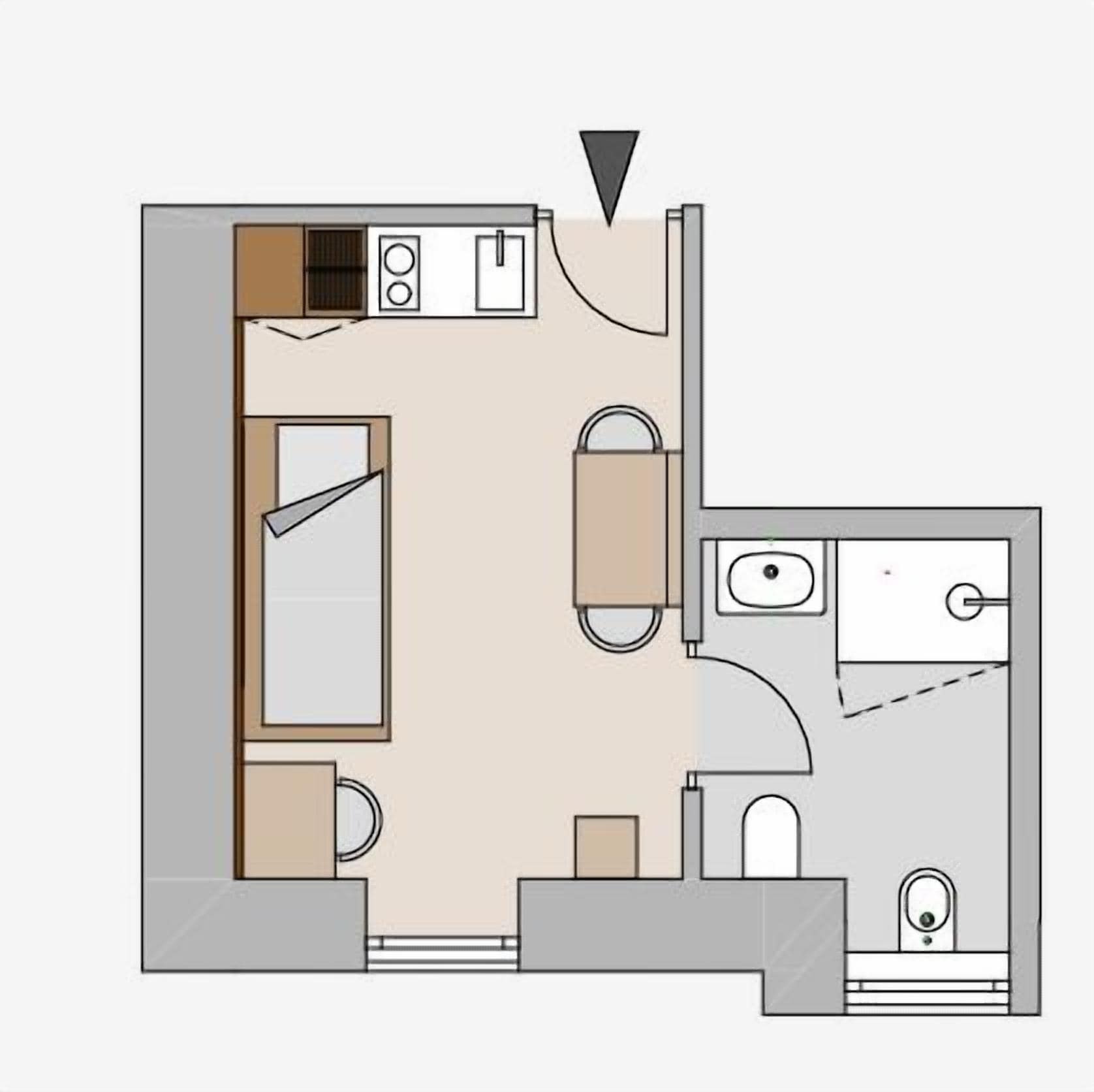 Un plan d’étage d’une chambre d’hôtel comprenant une salle de bain, un coin cuisine, un lit, un espace salon et une petite table.